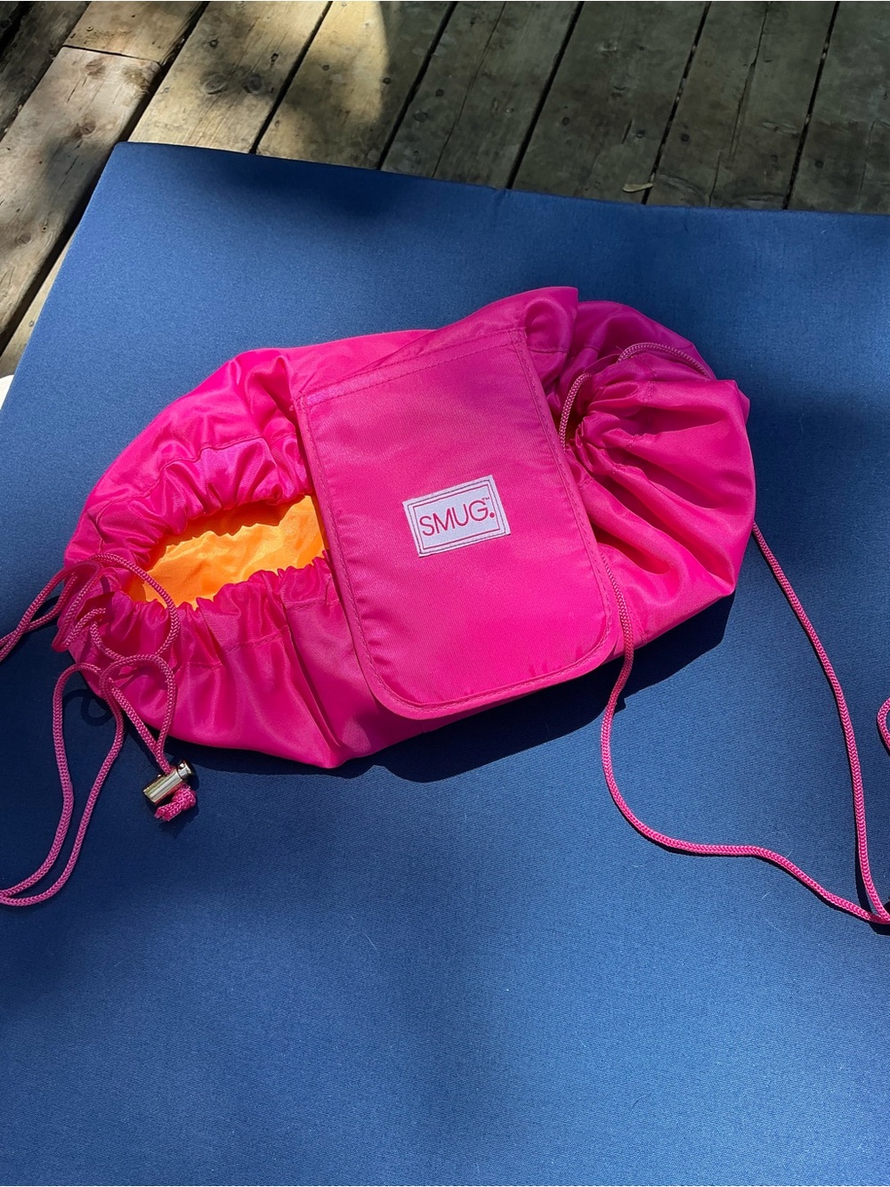 SMUG Hot Pink Drawstring Makeup Bag with Orange Interior